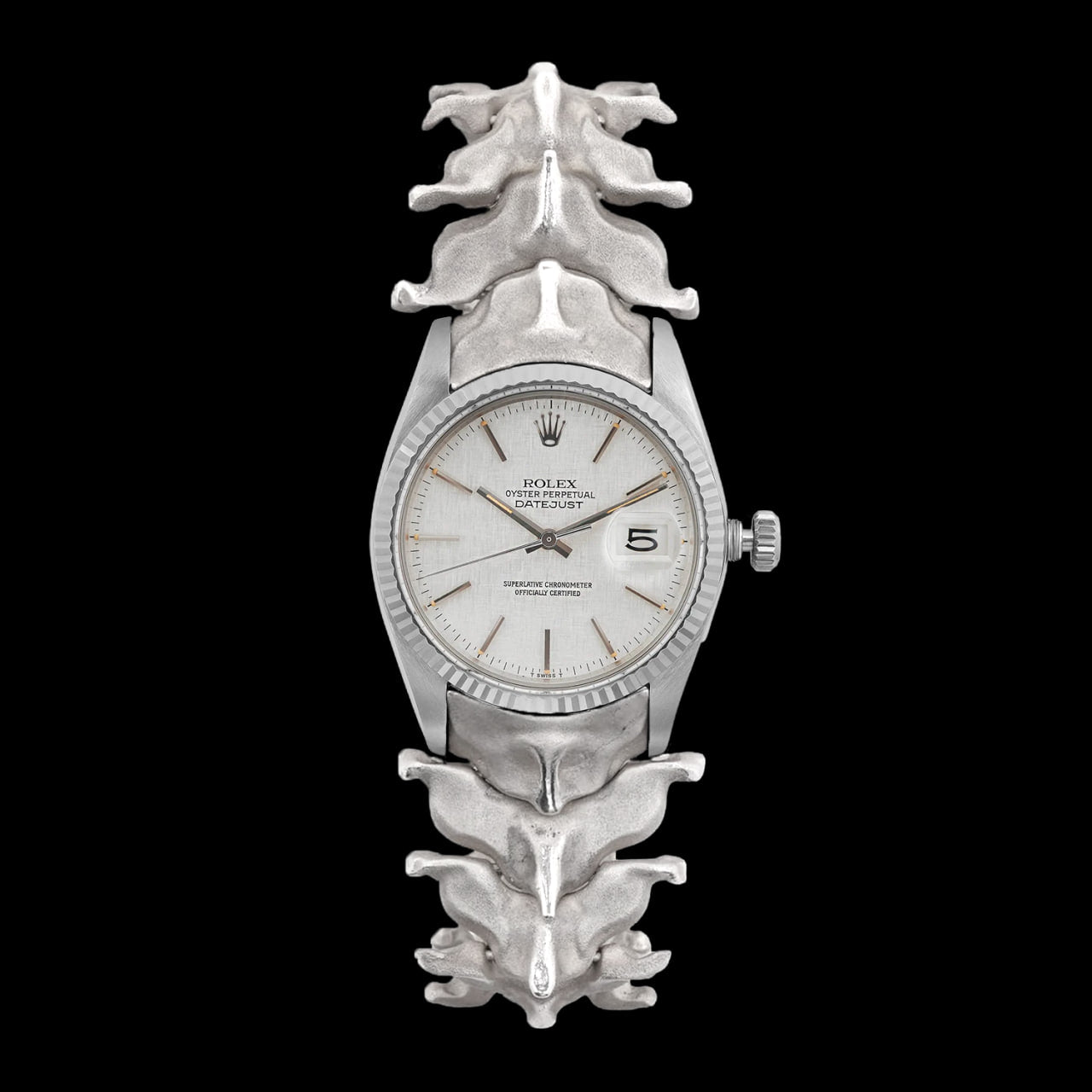 Horologium Spinale — a vintage Rolex Datejust with a silver linen dial set into a sterling silver vertebrae bracelet.
